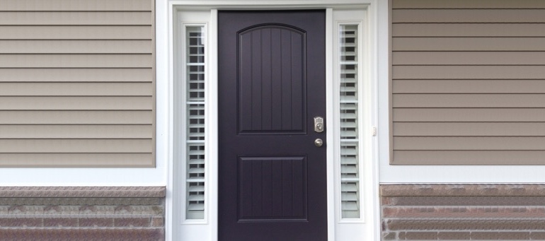 Sidelight Shutters On Black Door In Austin, TX